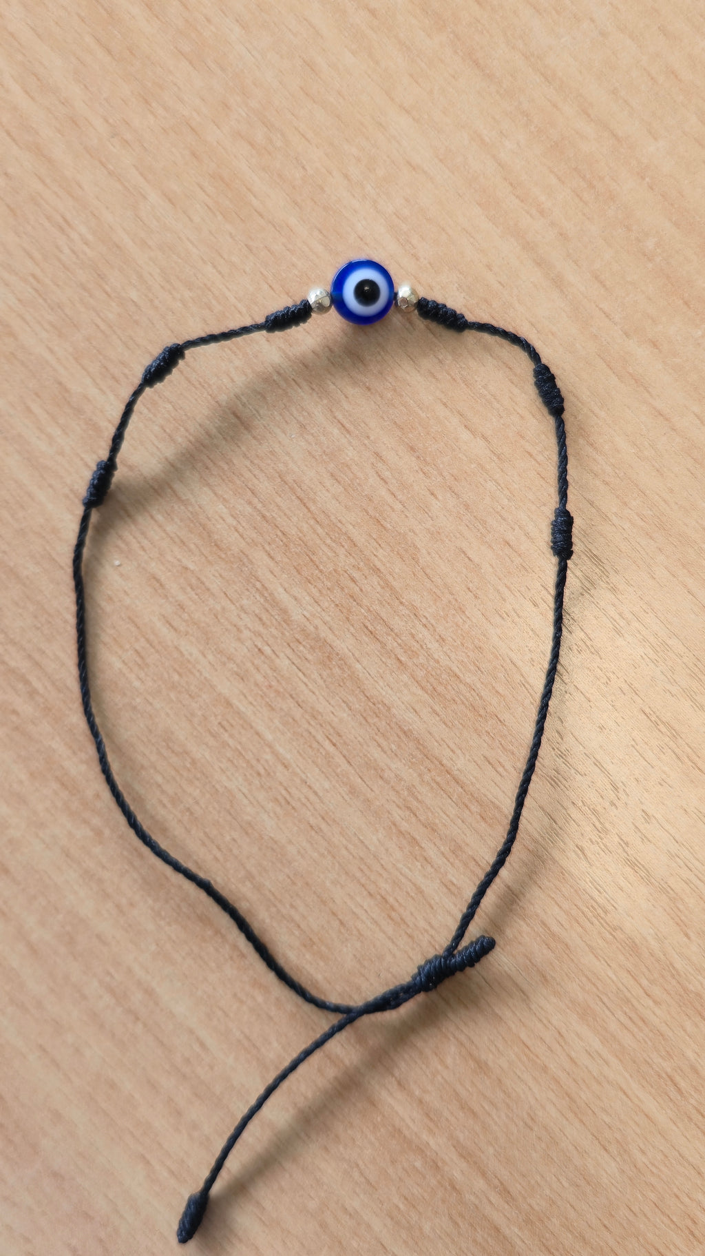 Verstellbares Evil-Eye-Armband, Schwarze Kordel, Glasperle, Sehr guter Zustand
