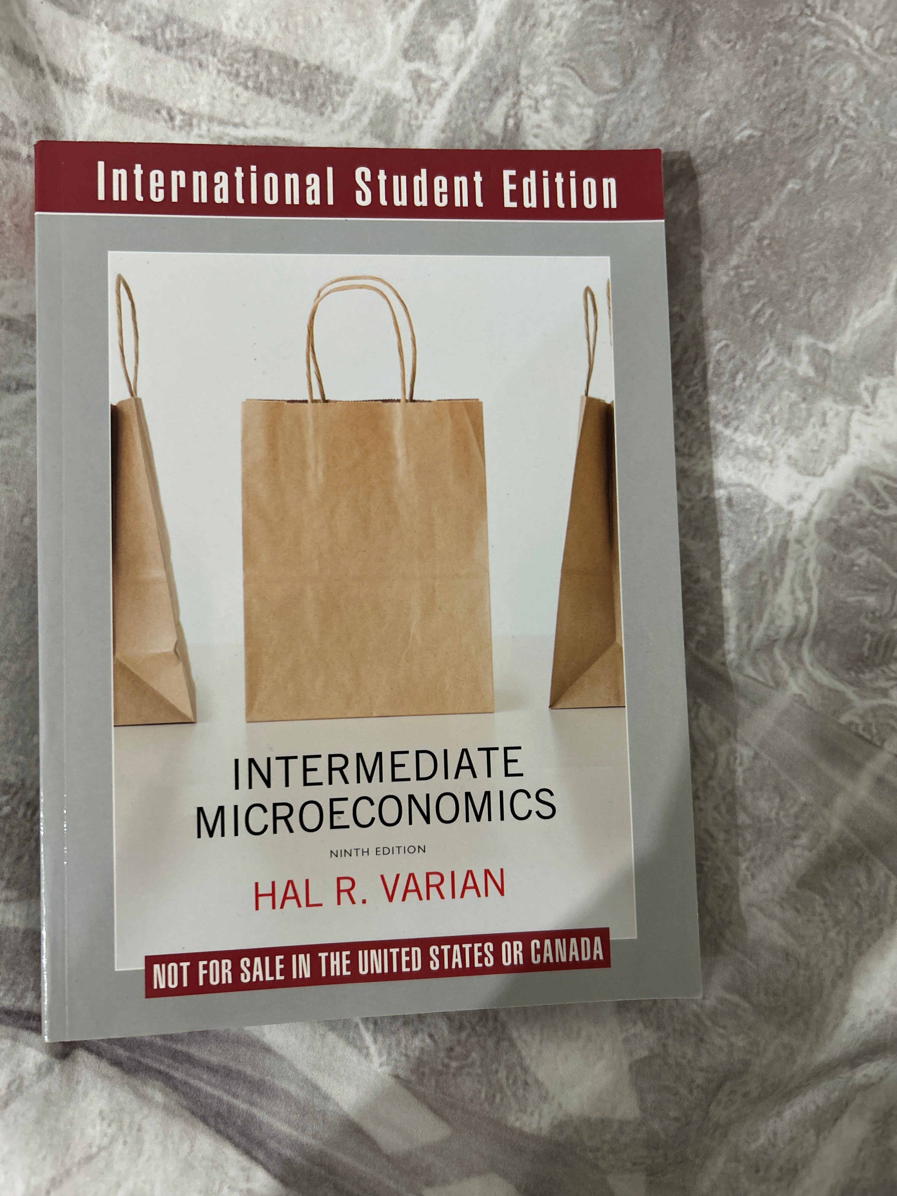 Varian Intermediate Microeconomics 9th Ed ISE Paperback Very Good