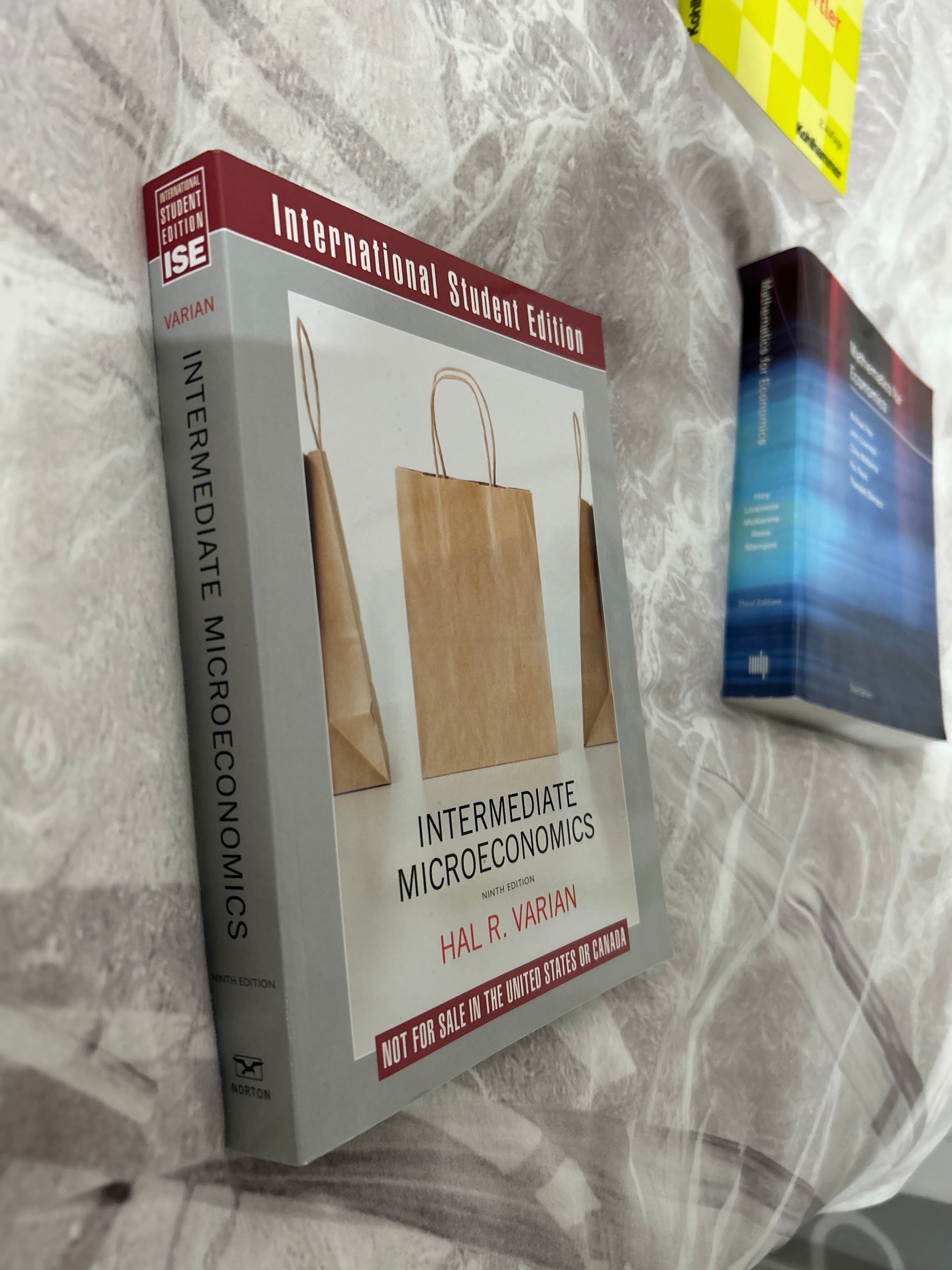 Varian Intermediate Microeconomics 9th Ed ISE Paperback Very Good
