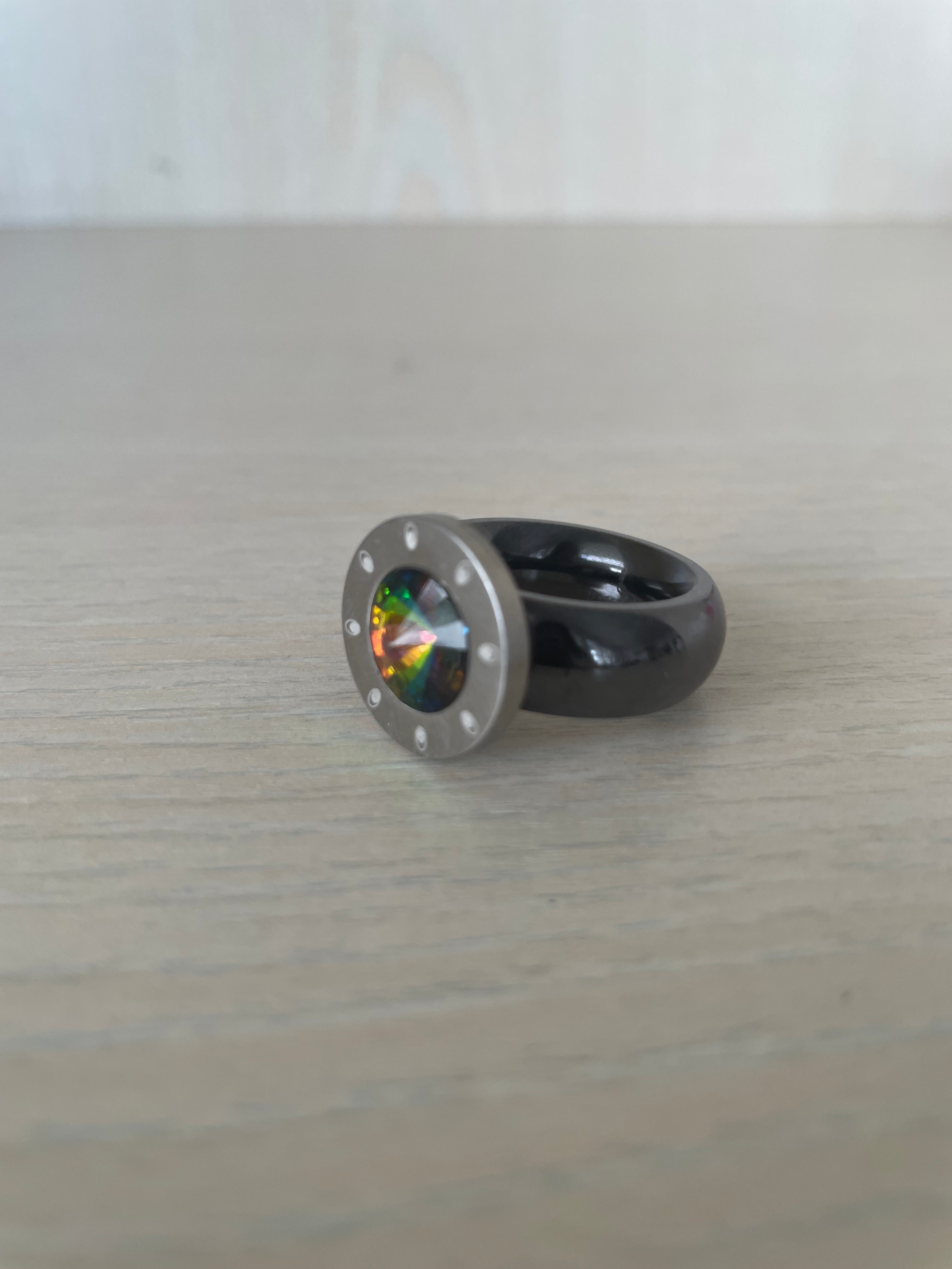 Pavo Real interchangeable ring, black steel + 6 tops, VG condition