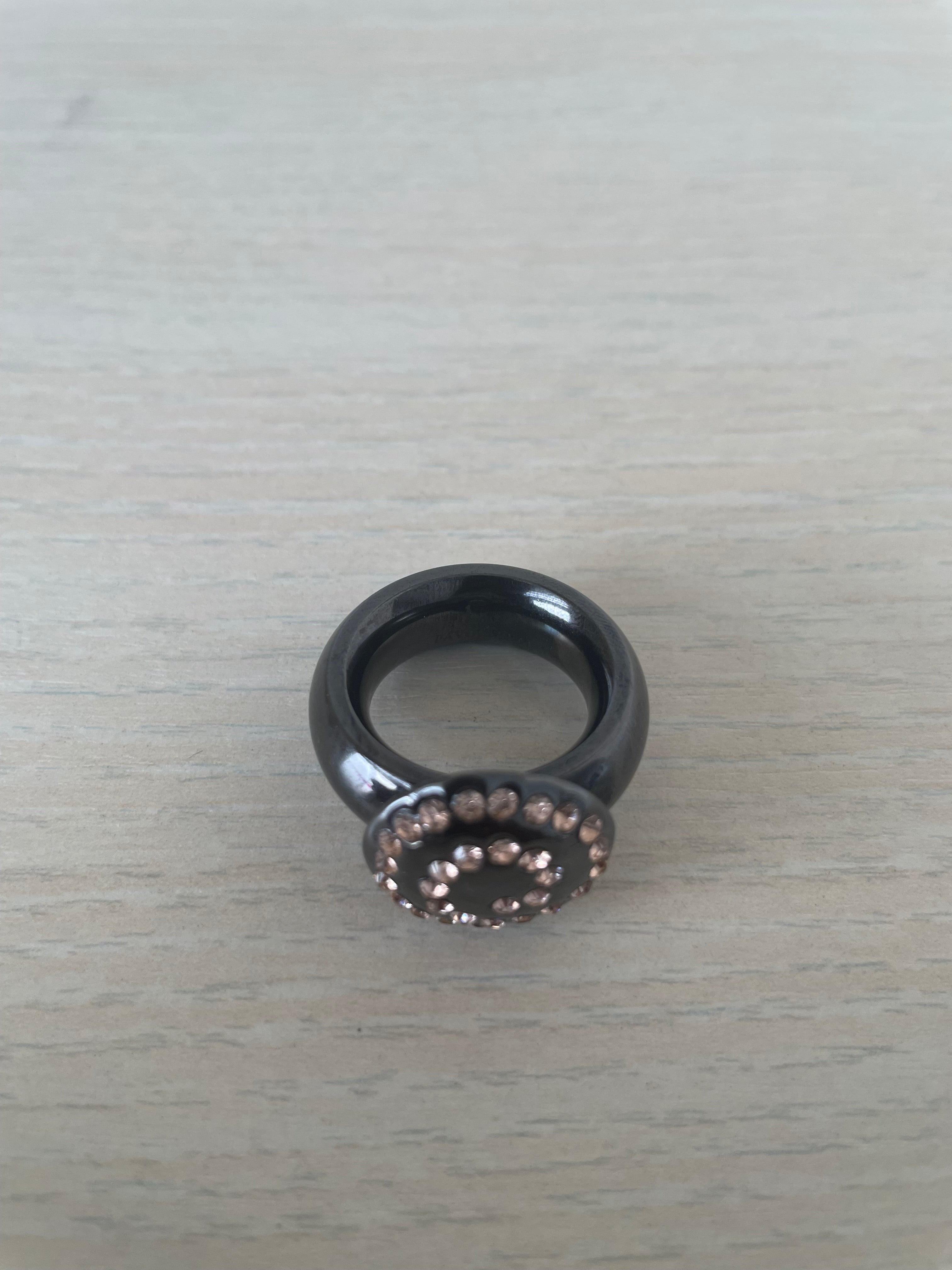 Pavo Real interchangeable ring, black steel + 6 tops, VG condition