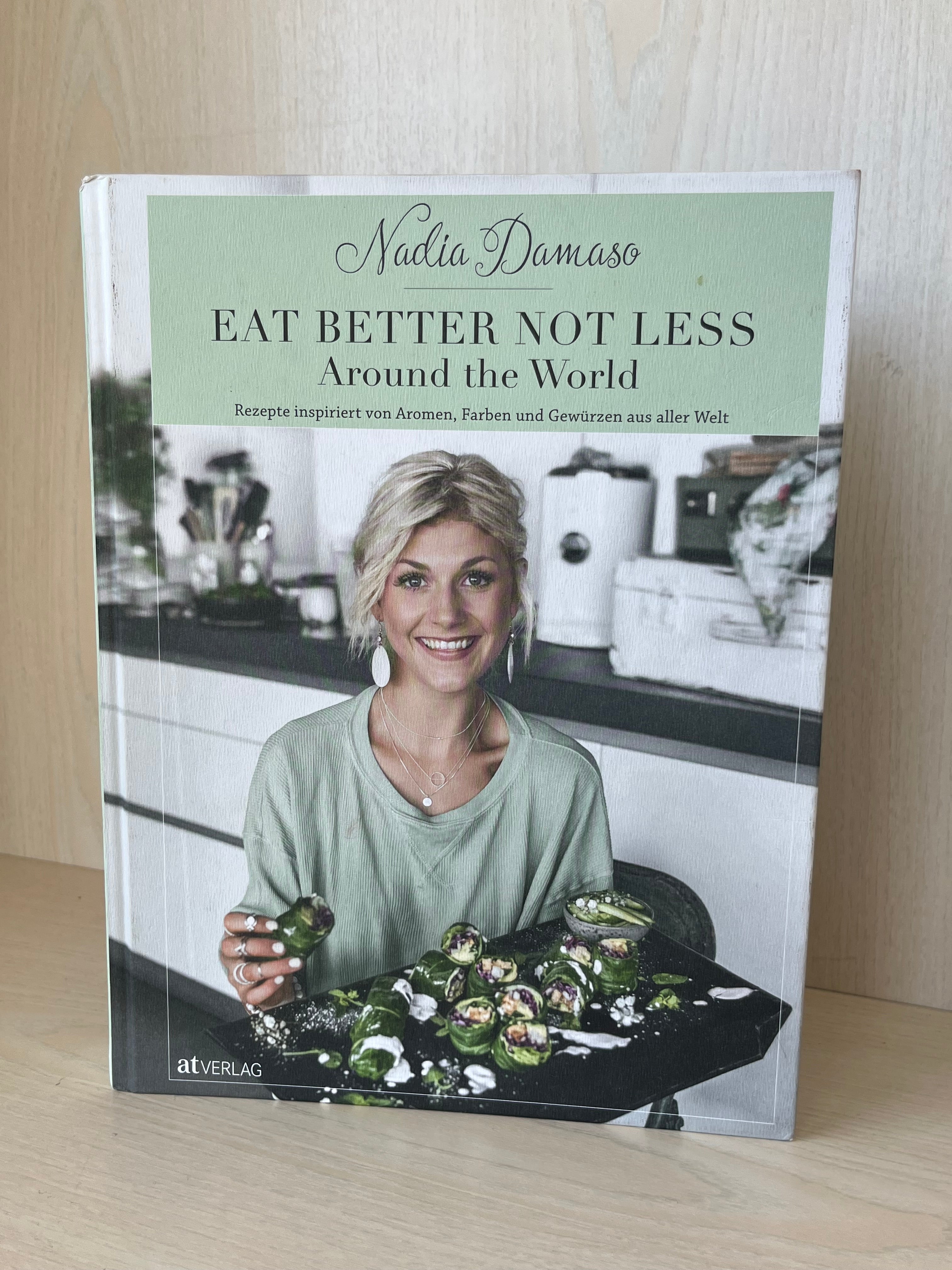 Eat Better Not Less: Around the World by Nadia Damaso, Hardcover, Very Good