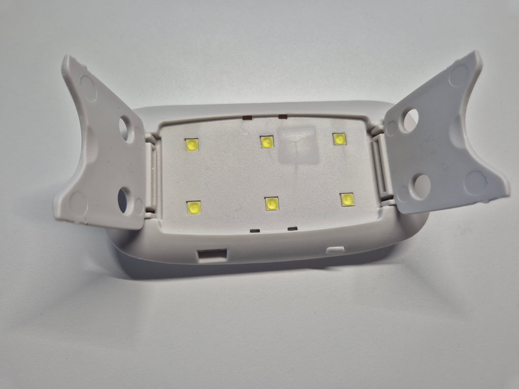 MANIKO UV/LED Nagellampe 6W Weiß Kompakt – Faltbar, guter Zustand