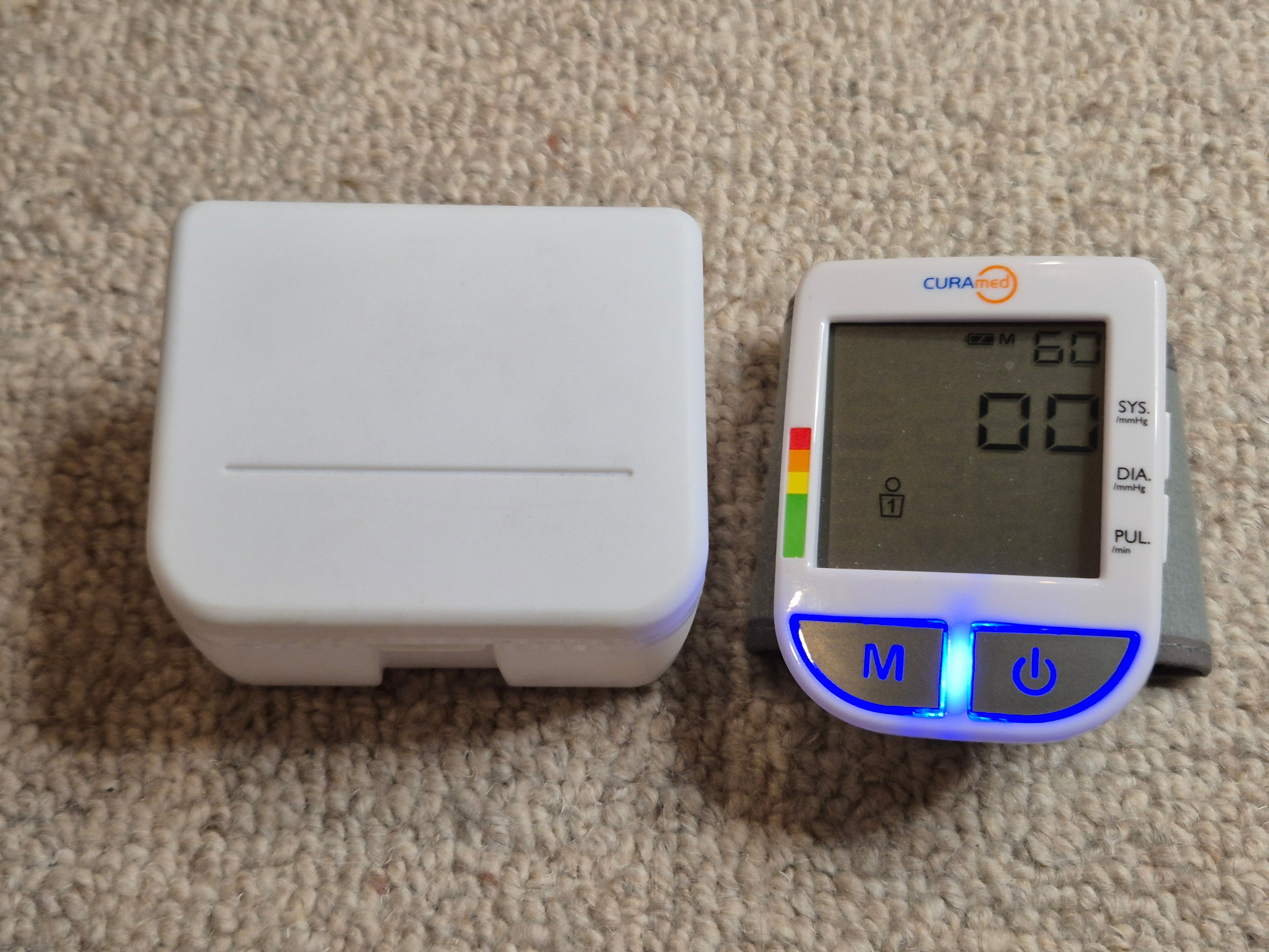 CURAmed MD 13400 Wrist Blood Pressure Monitor White Compact – Very Good