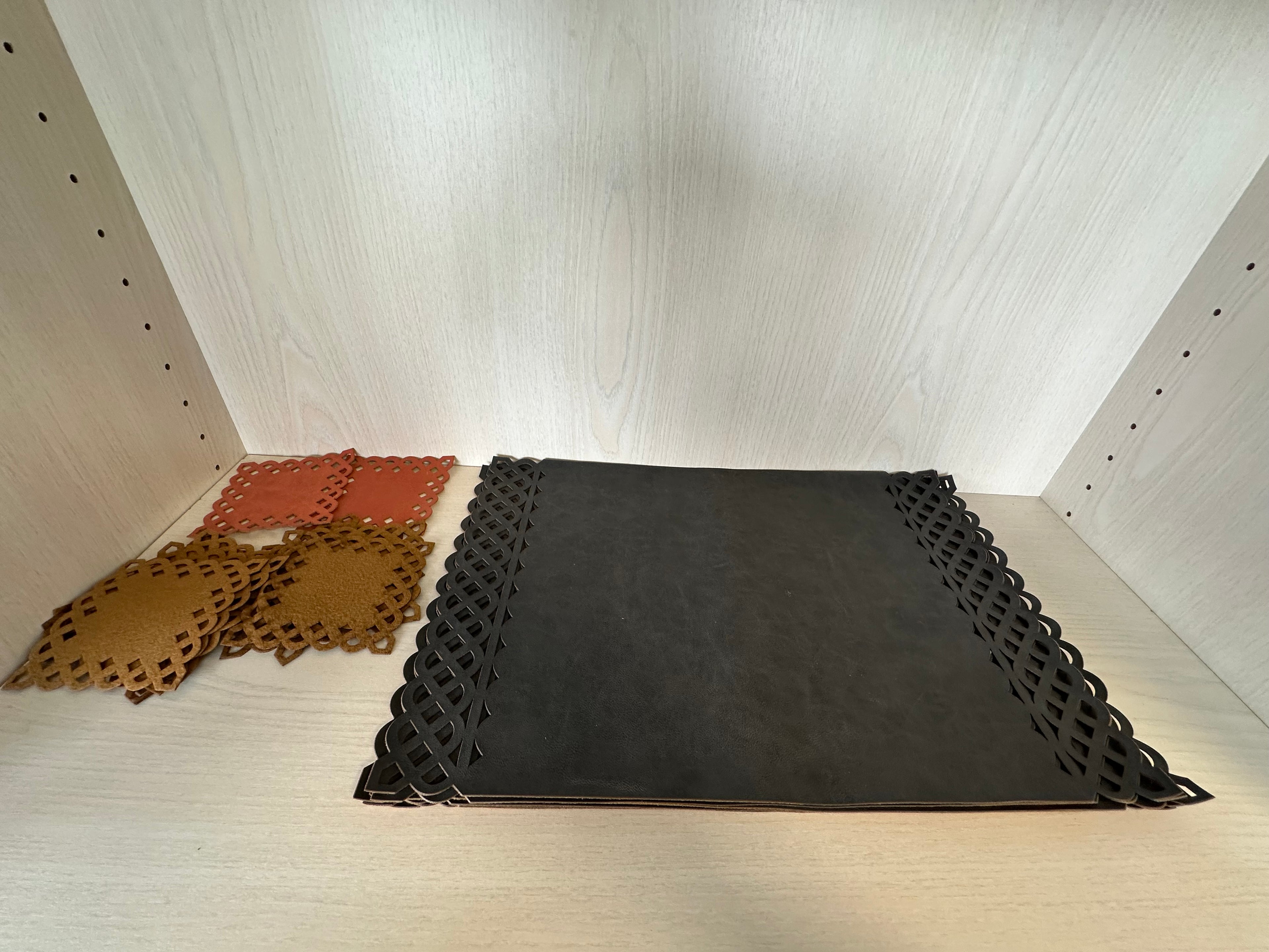 Dériver Leather Lace placemats, black & mustard, set of 7, good condition