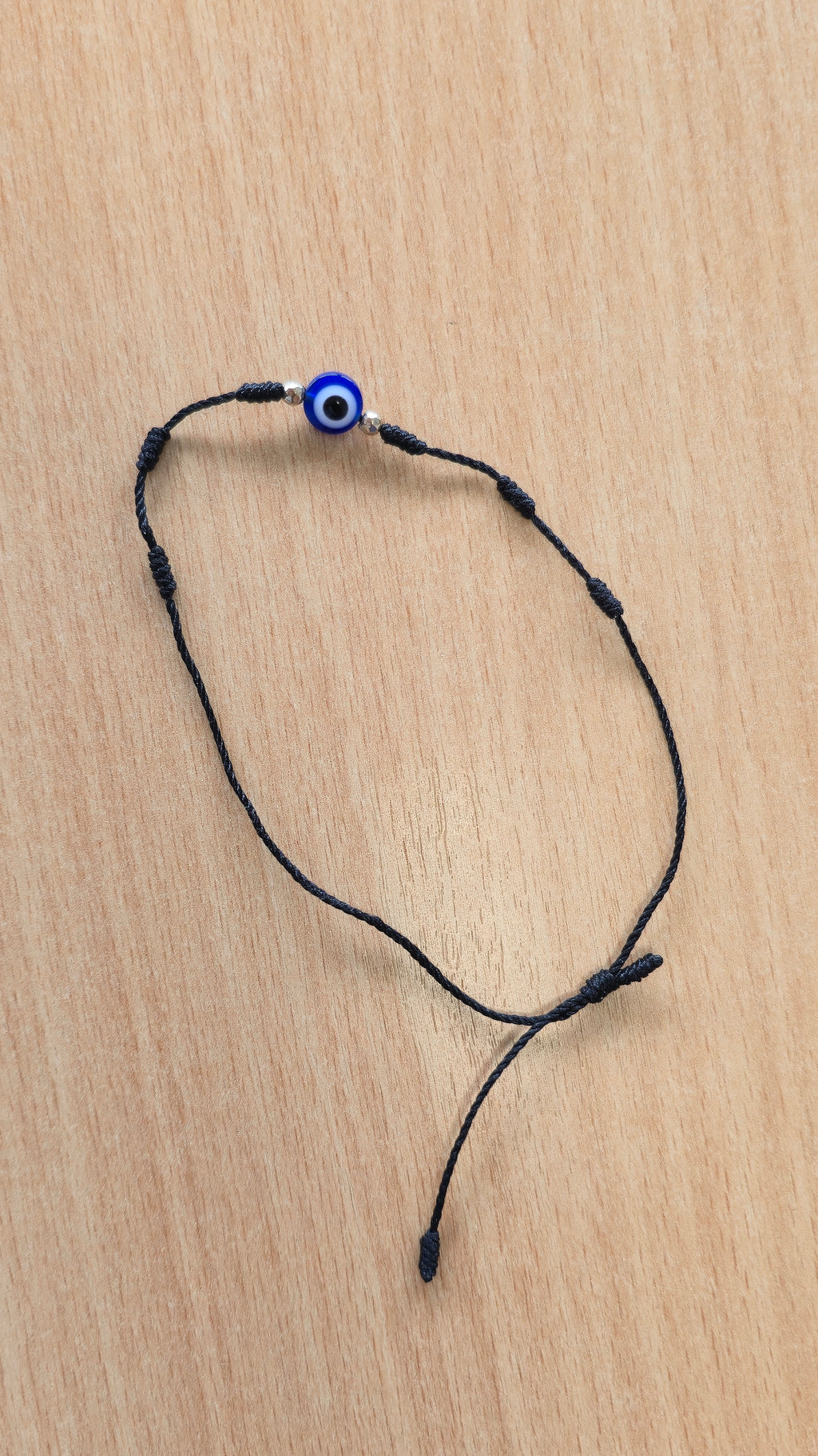 Verstellbares Evil-Eye-Armband, Schwarze Kordel, Glasperle, Sehr guter Zustand