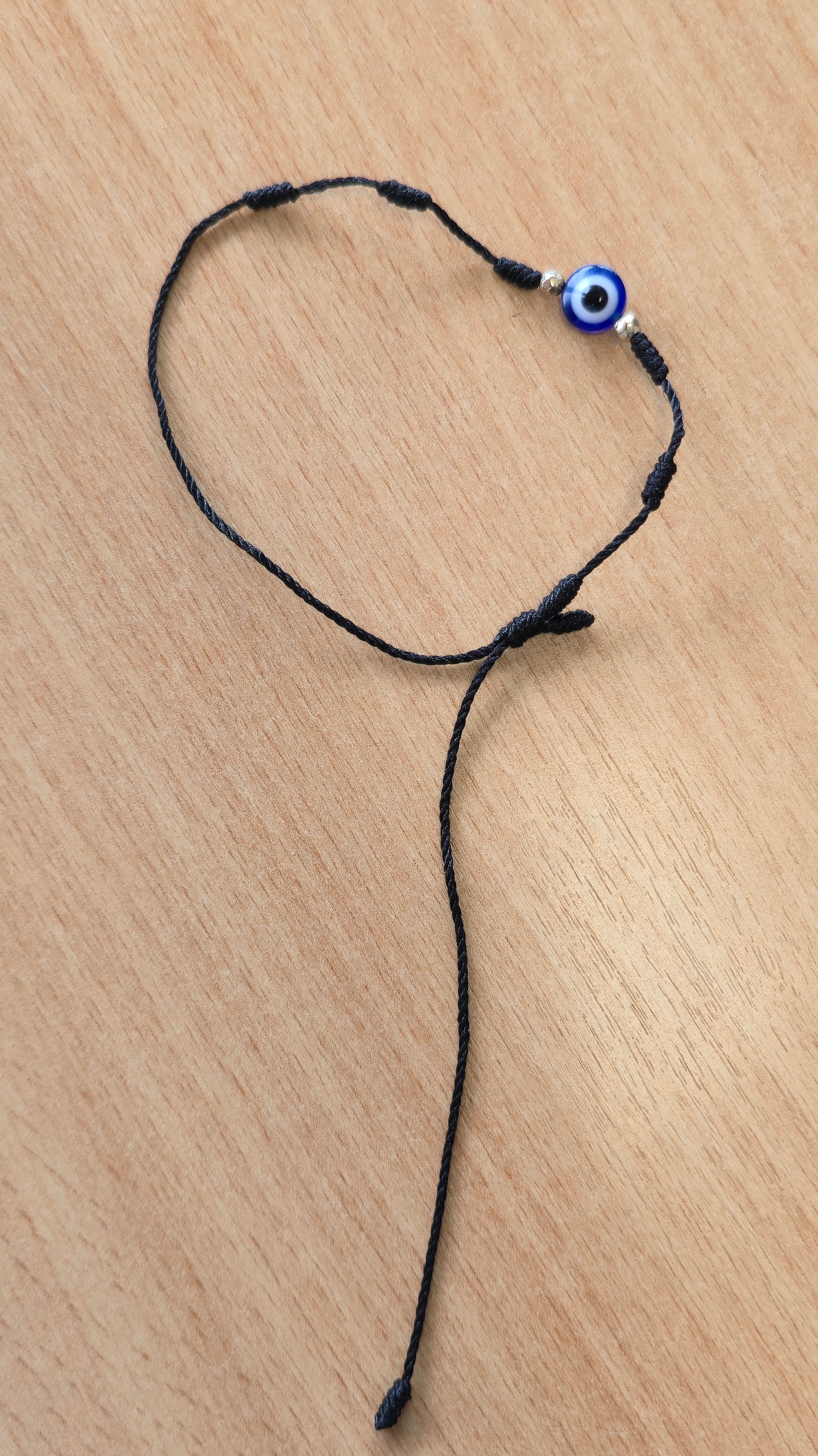 Verstellbares Evil-Eye-Armband, Schwarze Kordel, Glasperle, Sehr guter Zustand