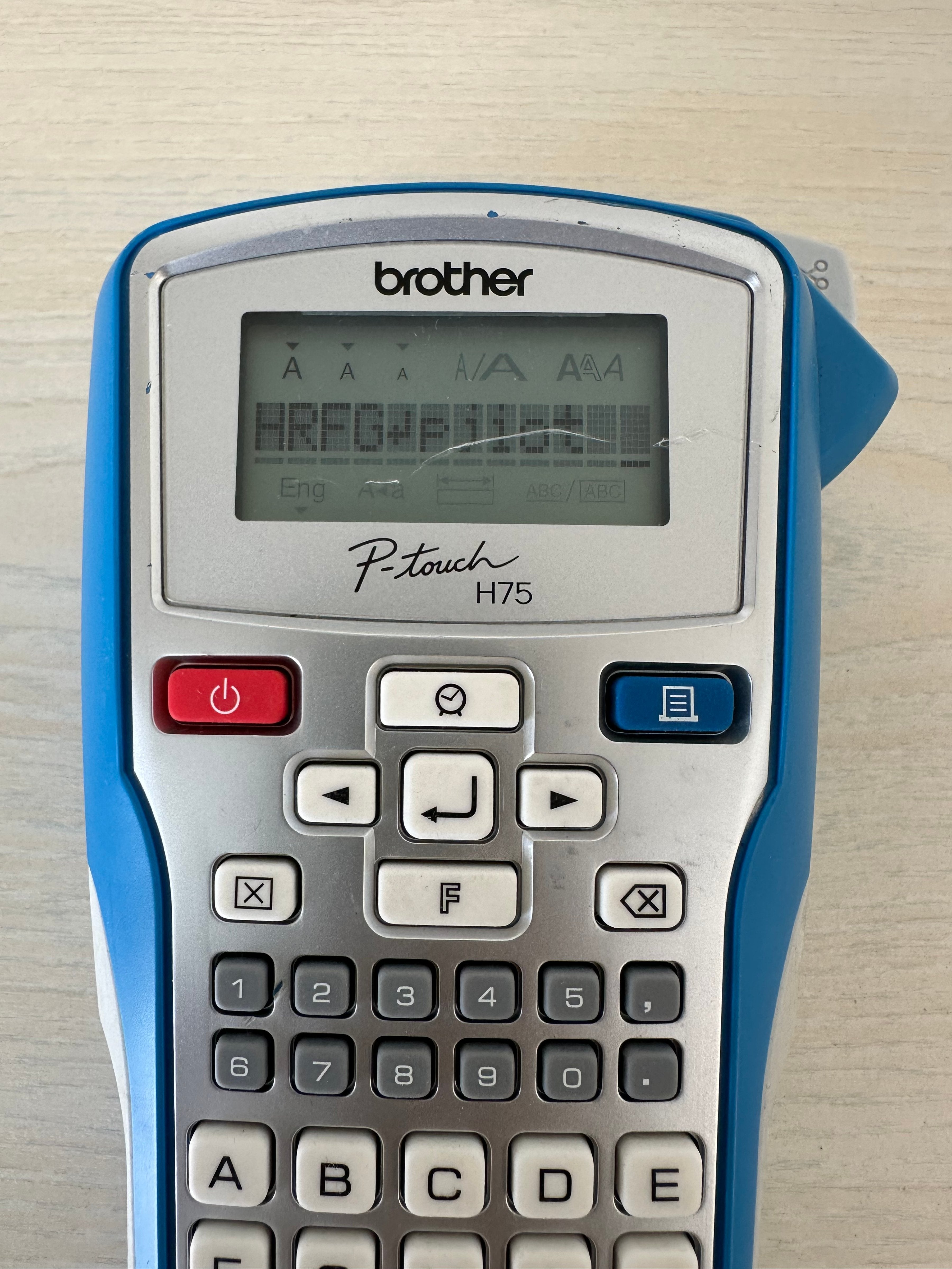 Brother PT-H75 Label Maker – Handheld, Plastic, Blue/White, Good Condition