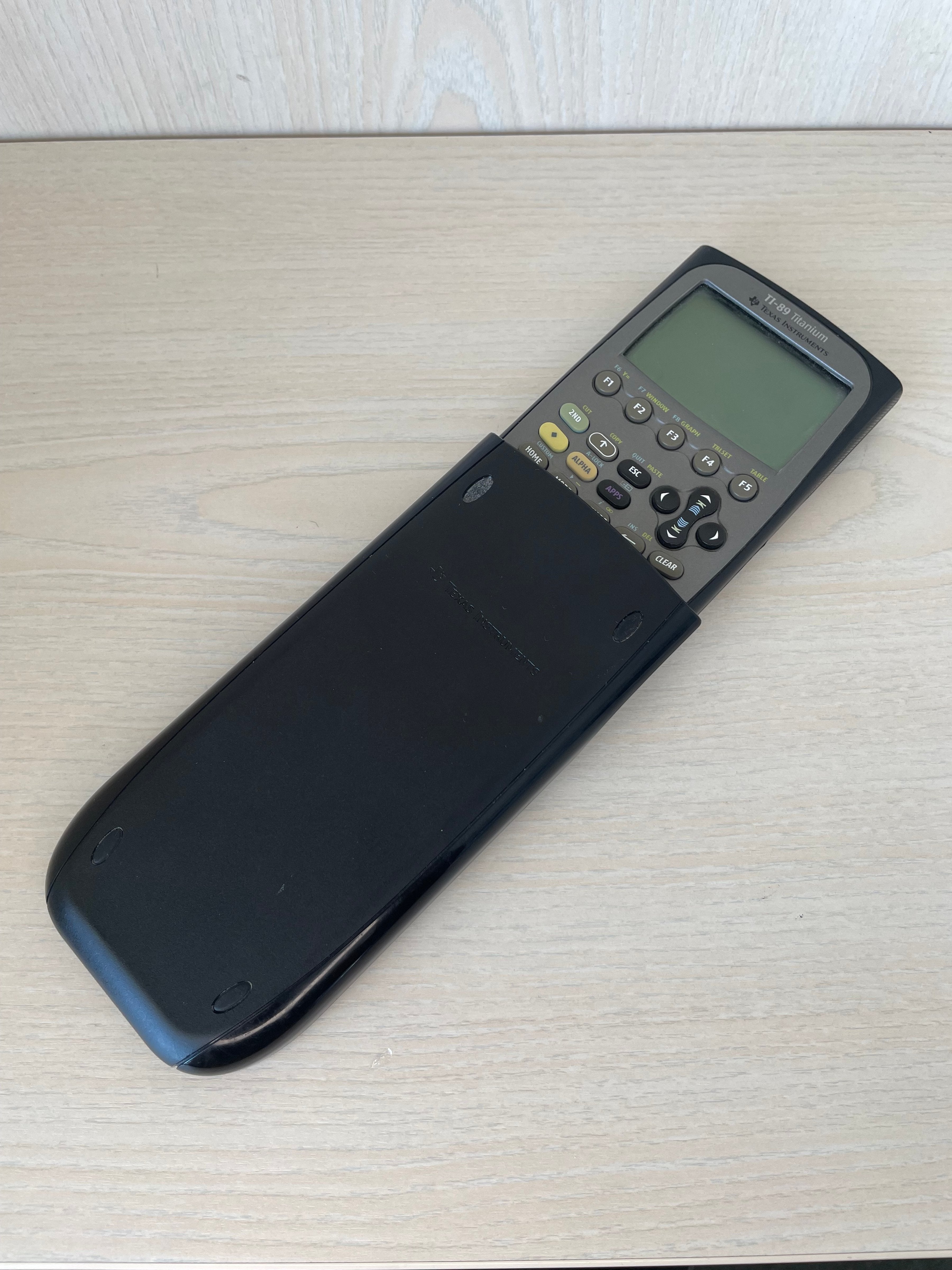 Texas Instruments TI-89 Titanium Grafikrechner, Schwarz/Grau, Gebraucht